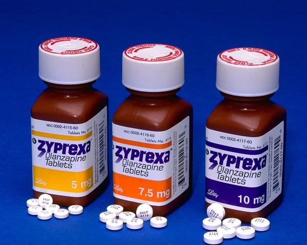 Three bottles of Zyprexa olanzapine tablets.